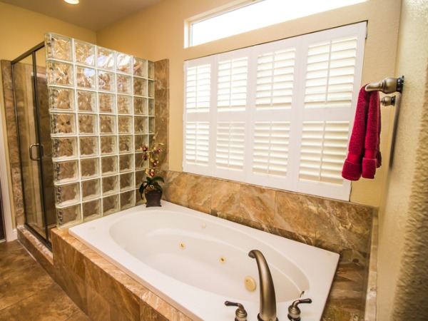 bathroom casement windows with plantation shutters window treatment